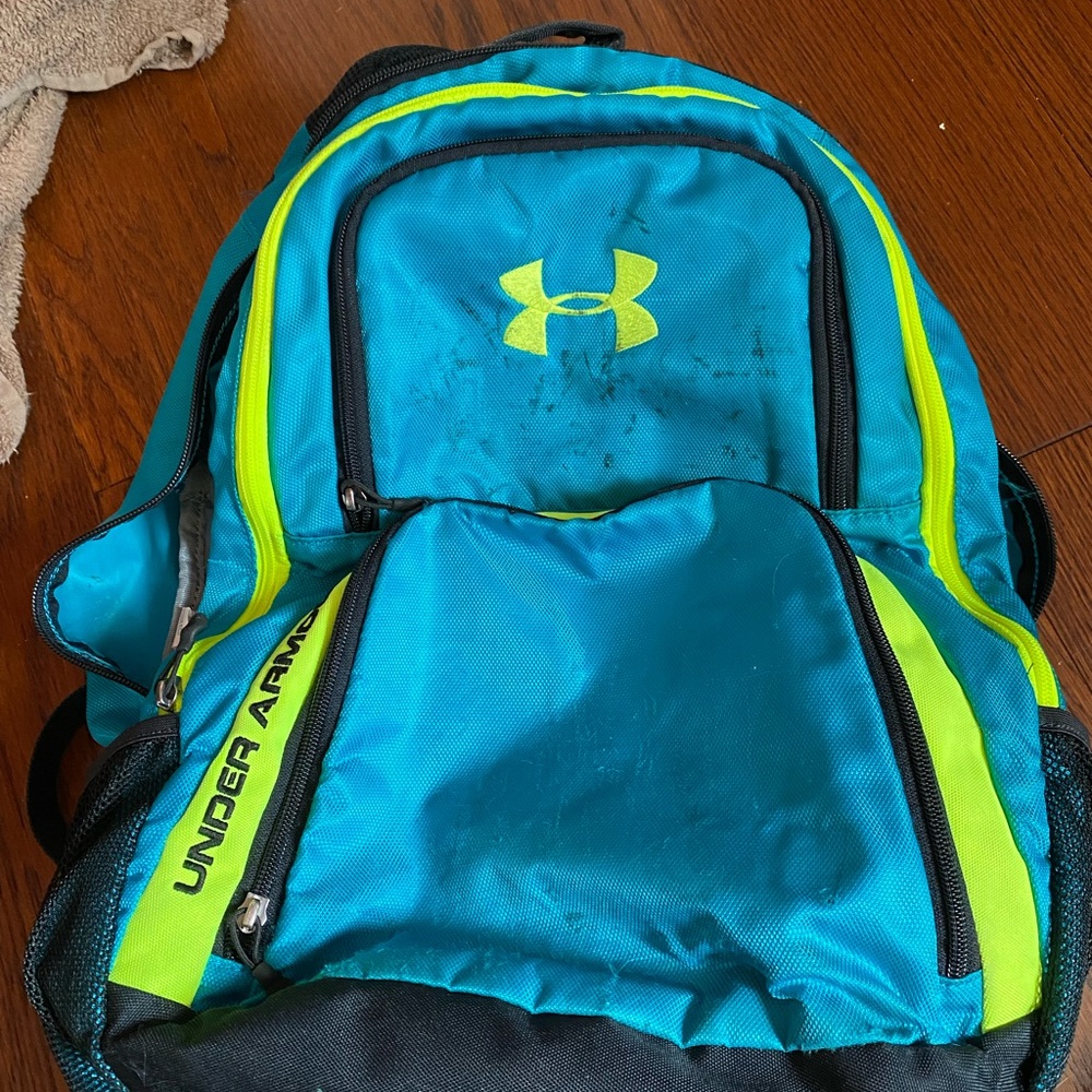blue and green under armor book bag